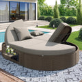 Divano Letto da Giardino in Rattan con Tavolino Pieghevole e Schienale Regolabile